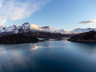 Panoramic drone view of Holandsfjord and Nordfjord in Nordland county. In the background is the Svartisen glacier, Norway's second largest glacier