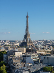 Panoramic view of the Eiffel tower, on the Parisian buildings in the center,  Arc de Triomphe de l'&Eacute;toile, located on the Charles de Gaulle square, and at the western end of the Champs Elys&eacute;es avenue 