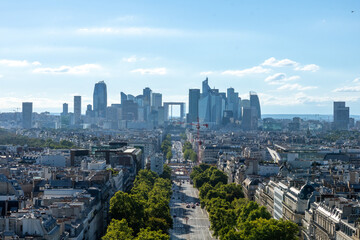 Fototapeta premium Panoramic view of the arch of La Défense, Arc de Triomphe de l'Étoile, located on the Charles de Gaulle square, and at the western end of the Champs Elysées avenue 