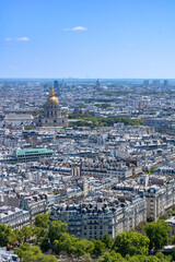 Fototapeta na wymiar Aerial panoramic view of the city of Paris, France. Hotel dels Invàlids, Arc de Triomf de l'Étoile, Musée de l'Armée, Tour Eiffel - Parc du Champ-de-Mars.