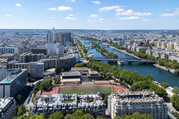 Panoramic view of Émile Anthoine Stadium, the roofs of the buildings around the Tour Eiffel and...
