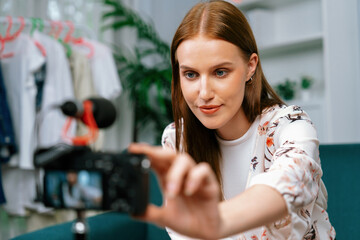 Woman influencer shoot live streaming vlog video review makeup utmost social media or blog. Happy young girl with cosmetics studio lighting for marketing recording session broadcasting online. - obrazy, fototapety, plakaty