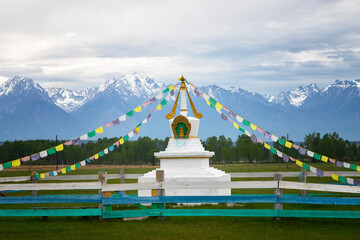 Buddhist stupa against the backdrop of mountains. Buryatia, Russia