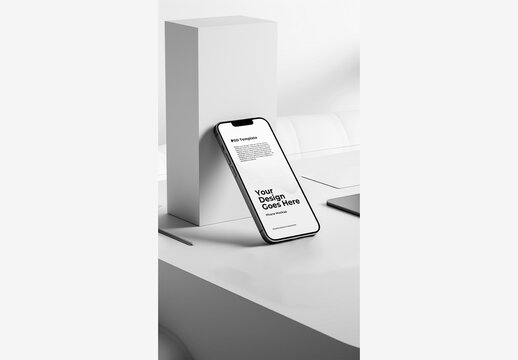 White Phone Mockup Screen Template on Desk with Laptop and Holder, White Surface, Box on Wall