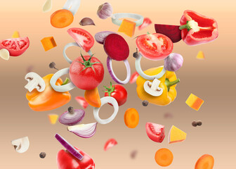 Different fresh vegetables in air on beige gradient background