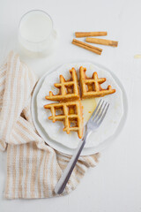 Waffle with honey. Aesthetic composition. Food Styling.