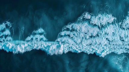 Crashing Waves Casting Mesmerizing Swirls of Foaming Blue Across the Vast Ocean Horizon