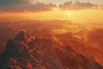 The rugged mountain peaks are bathed in the warm glow of the setting sun