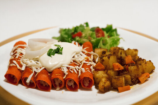 Enchiladas con papitas Mexican food