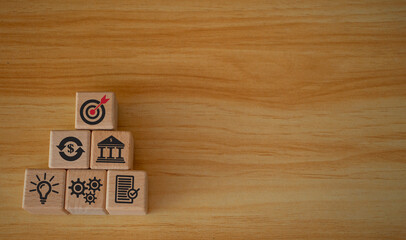 Business goal, plan. wooden cubes with icon business strategies, action plan, goal, process, game...