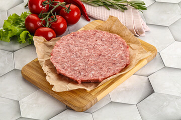 Raw beef uncooked burger cutlet
