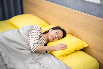 Woman sleep on bed at home