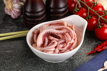 Delicous marinated squid tentacles in the bowl