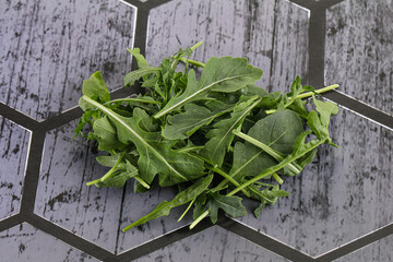 Green Arugula heap over background