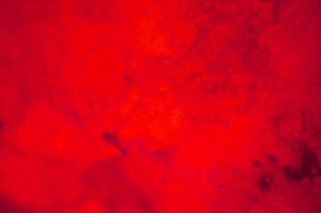 Abstract background. Reddish orange color. Rock salt.