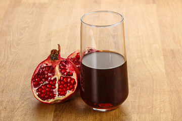 Sweet pomegranate juice in glass