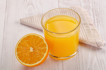 Sweet fresh orange juice in the glass