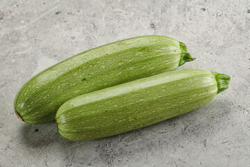Raw green ripe zucchini vegetable