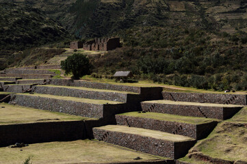 Sequence of terraces and well-preserved stone building in the citadel of Típon in Peru