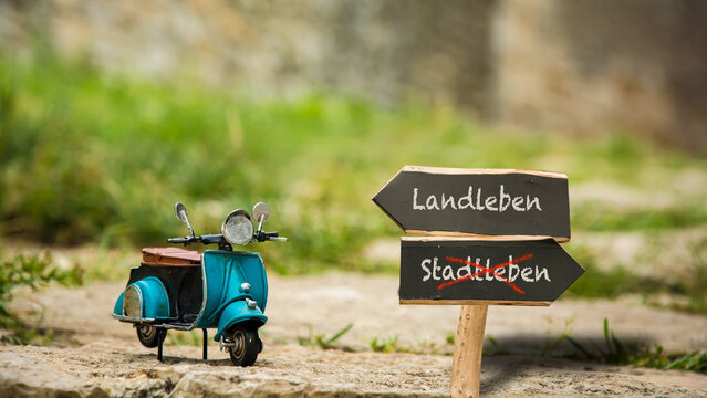 Signposts the direct way to country life versus city life