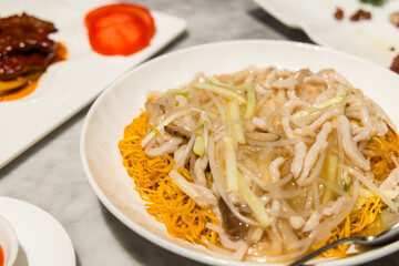 Deep fried noodles with vegetable in cantonese restaurant