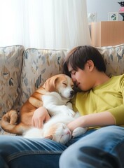 A man is sleeping on the couch with a dog and a cat