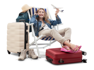 Tourist woman in travel attire, on deck chair with trolley suitcases, show a model airplane, using mobile phone. Summer beach holiday, flight and vacation travel booking. Travel influencer lifestyle