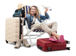Tourist woman in travel attire, on deck chair with trolley suitcases, show mobile phone screen and...