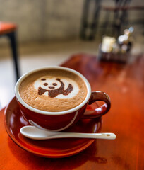 Cozy Café with a Panda Coffee Cup