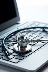 Modern medical technology concept with stethoscope on laptop keyboard