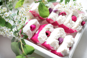 Handmade natural eco-friendly raspberry berry soap with raspberry scent on white background.