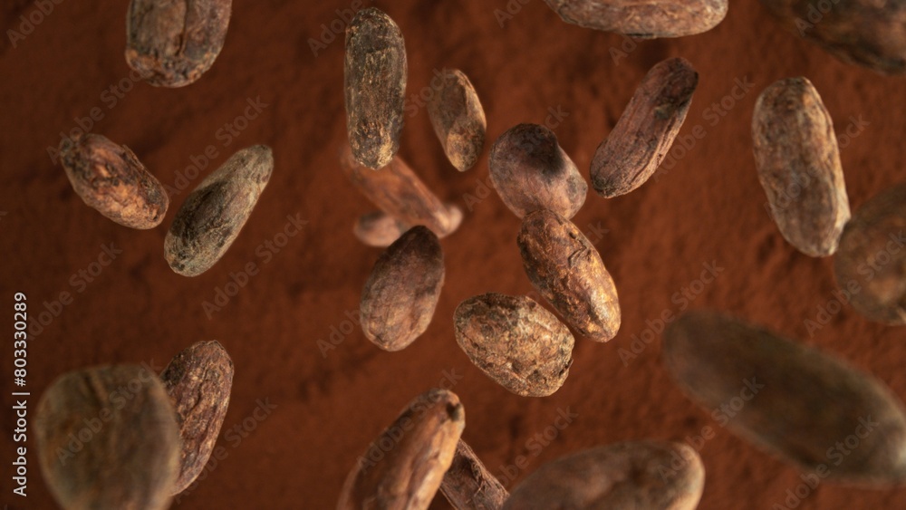 Poster freeze motion of flying group of cocoa beans.