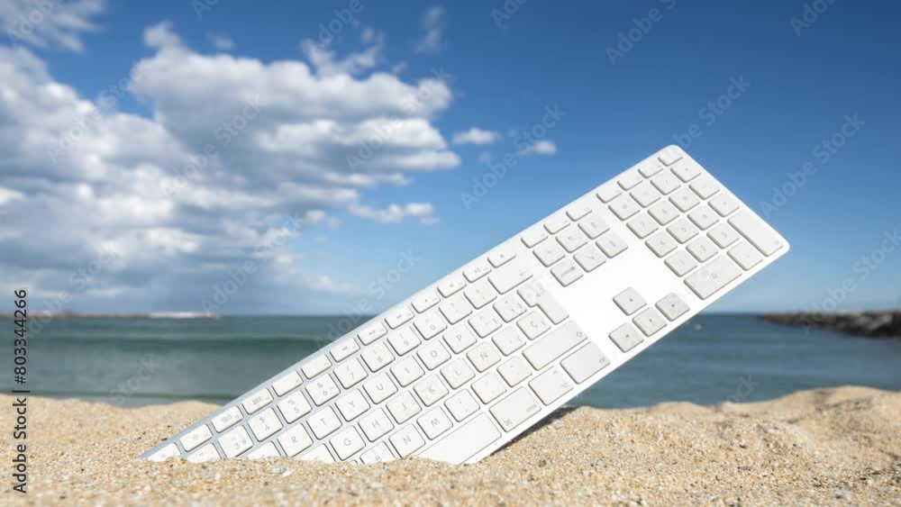Aufkleber computer keyboard on a beach