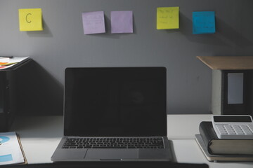 Studio workspace with laptop computer and office supplies. Work from home. With copy space