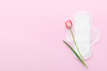 Feminine hygiene panty liner for menstruation. Menstrual cycle, pad. pink background. Tampons,...