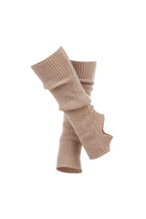 Subject shot of beige ribbed leg warmers with a hole for the heel. Long gaiters are isolated on the white background. Front view. Crossed legs.