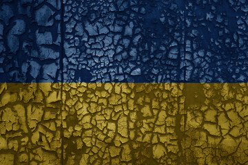 flag of ukraine on a grunge vintage metal rusty cracked wall background
