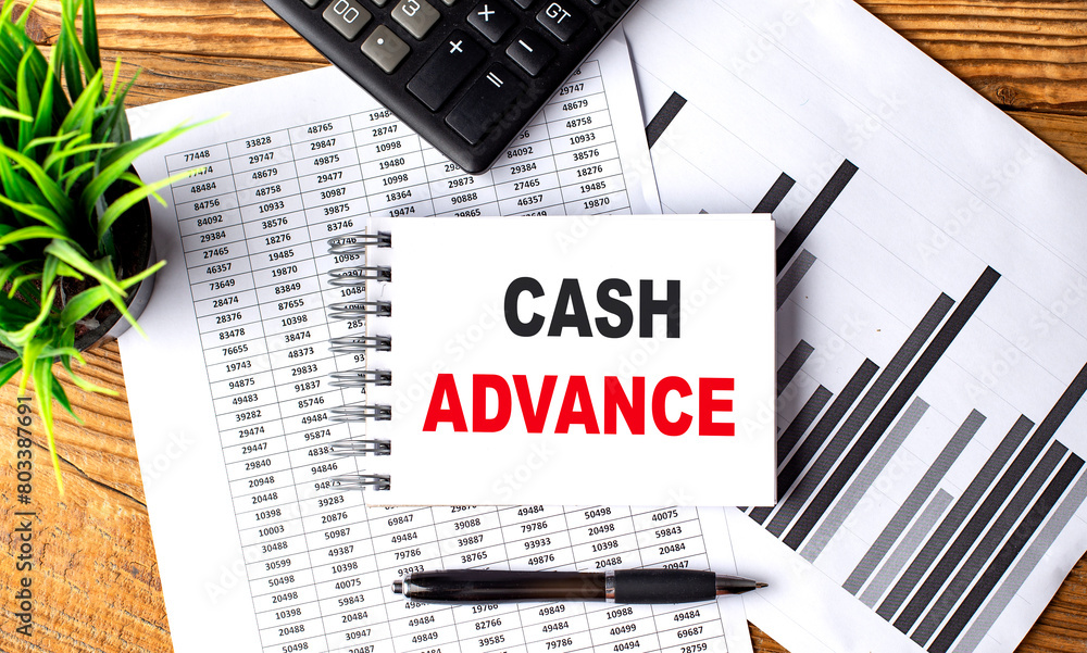 Poster cash advance text on notebook on chart with calculator and pen