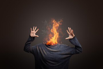 Head burning in flames showing burnout syndrome or mental illness.