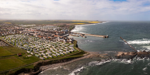 Aerial view of large holiday caravan parks in Seahouses town on the Northumberland coast
