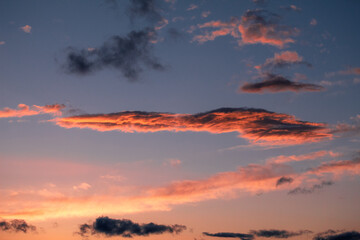 Beautiful colorful morning sky with clouds on fire.