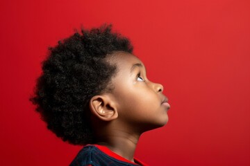 African American Young Boy Against Red Background - Ethnic Representation, Youth Culture, Cultural Diversity