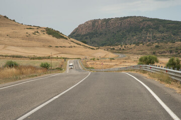 Road and Landscape of Planargia. Sassari, Alghero. Sardinia. Italy. Yellow landscape
