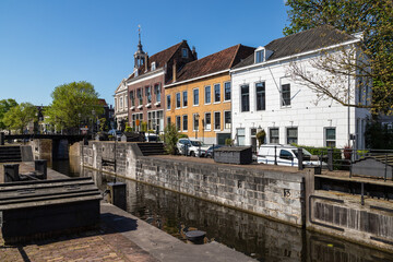 Fototapeta na wymiar Lock and monumental buildings in the historic center of Schiedam.