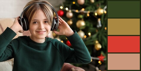 Cute little boy listening to Christmas music at home. Different color patterns