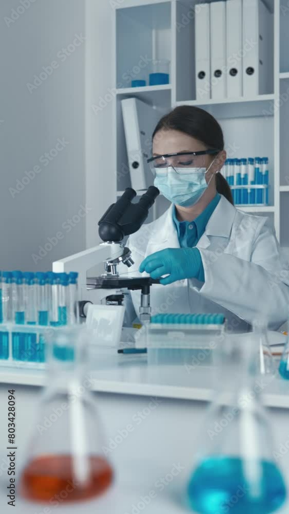 Poster In the laboratory, the bioinformaticist uses computer methods to analyze genomic data and identify genetic risk factors.