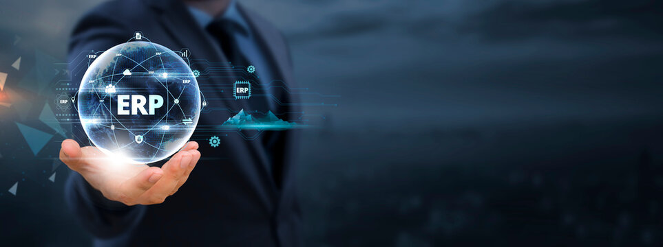 ERP: Businessman holds global business globe with network connected to ERP System, Streamlining Operations, Enhancing Efficiency, Optimizing Business Processes