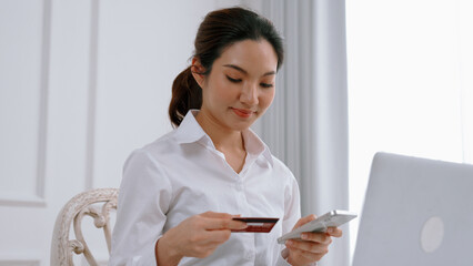 Woman shopping or pay online on internet marketplace browsing for sale items for modern lifestyle...