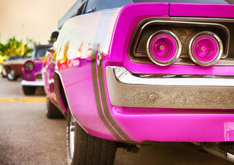 Hot pink custom vintage muscle car.