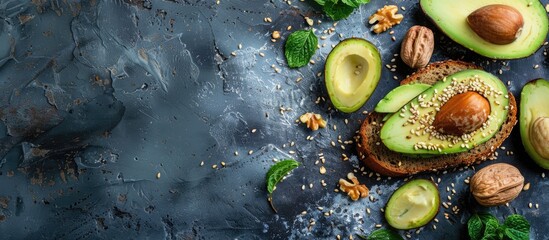Avocado toast made with rye bread, sliced avocado, cheese, pumpkin, nuts, and sesame seeds. Suitable for breakfast or lunch,
